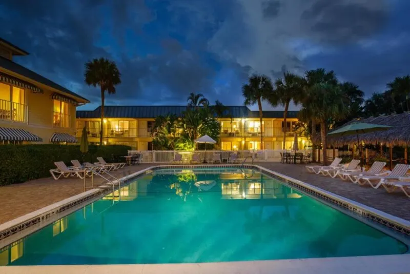 Pool Area At Night  At The Naples Garden Inn