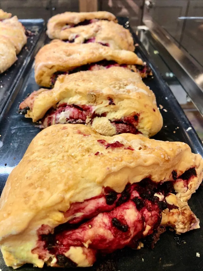 Marionberry scone with a lemon icing drizzle At Gingerbread Factory Leavenworth